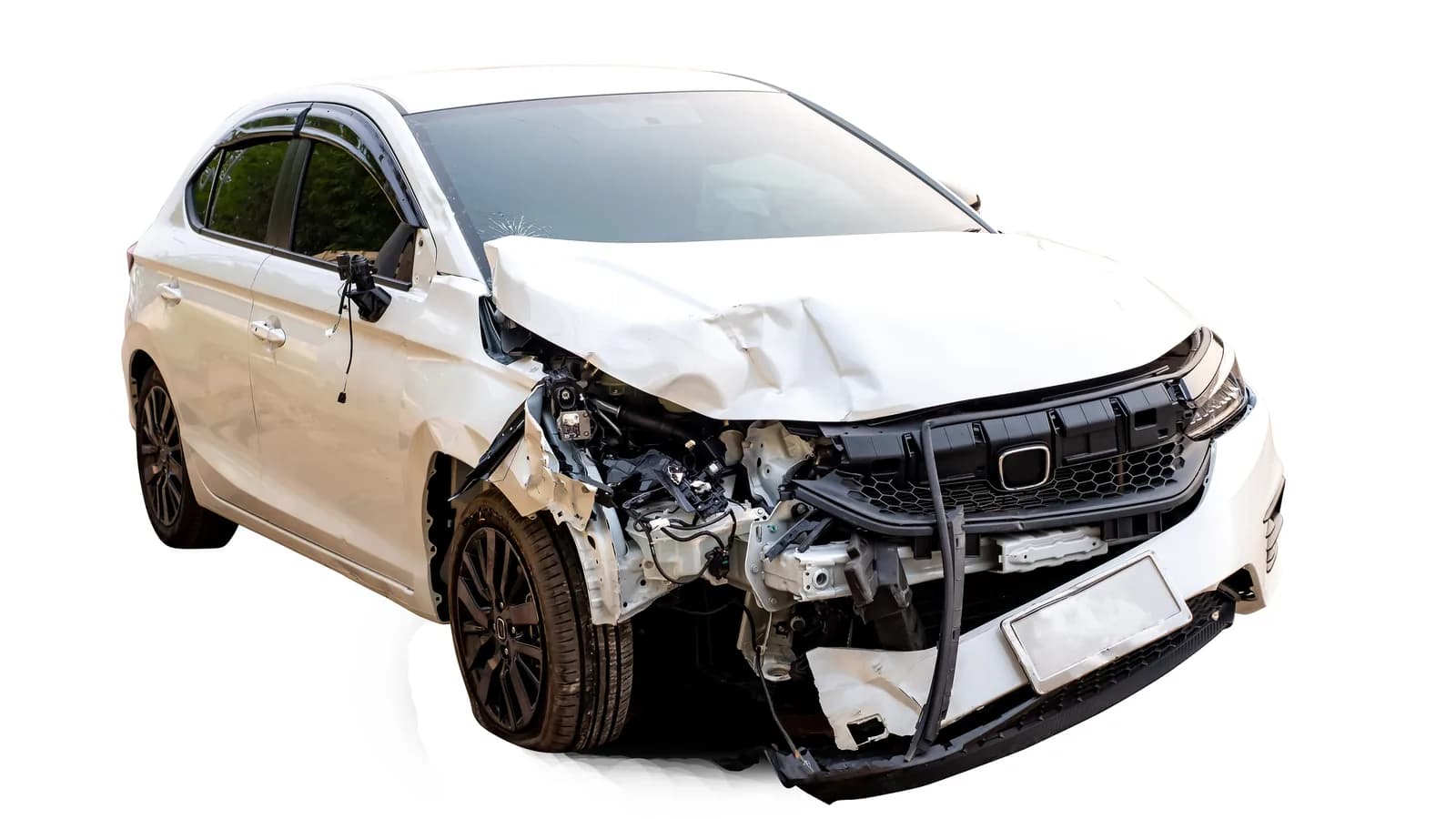A white car with heavy front-end damage after an accident: sell a wrecked car in Las Vegas